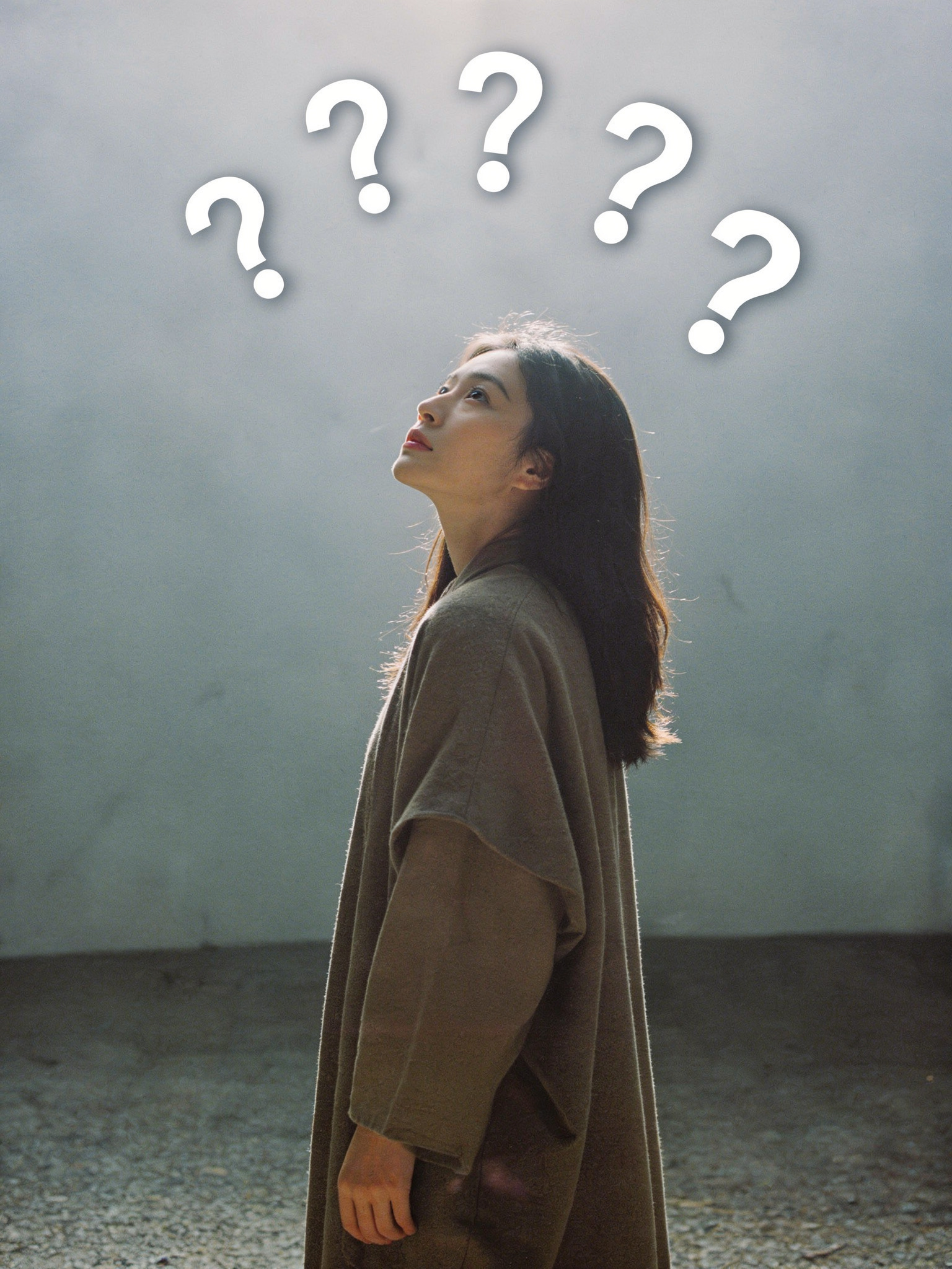 Puzzled Woman Looking Up